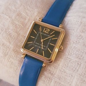 Marc Jacobs gold face, blue leather strap watch